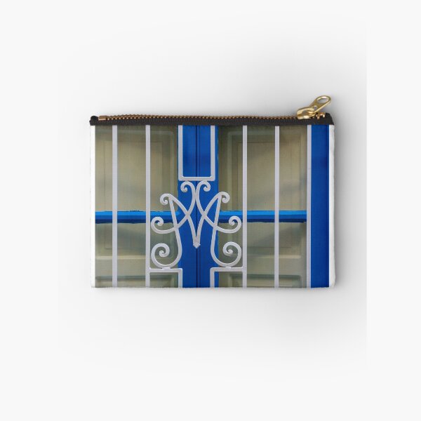 Item preview, Blue Window With Decorative White Wrought Iron Grille and Vertical Bars on Cream Wall designed and sold by Nmallia.
