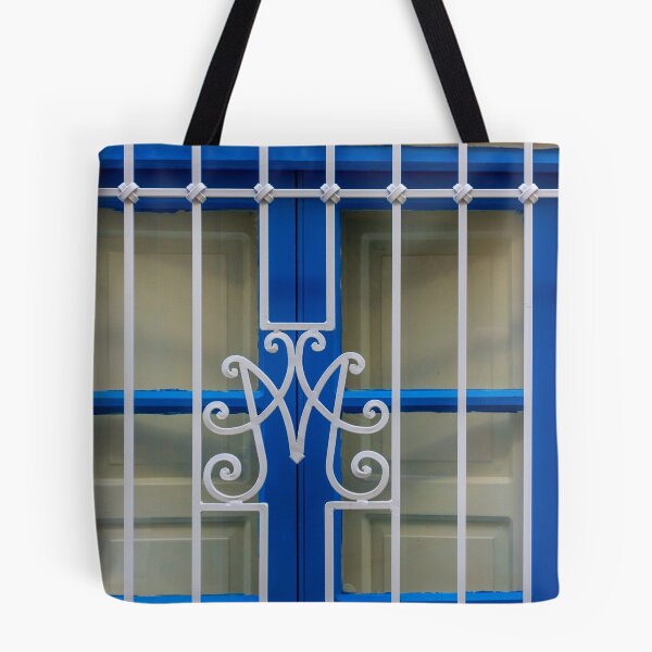 Item preview, Blue Window With Decorative White Wrought Iron Grille and Vertical Bars on Cream Wall designed and sold by Nmallia.