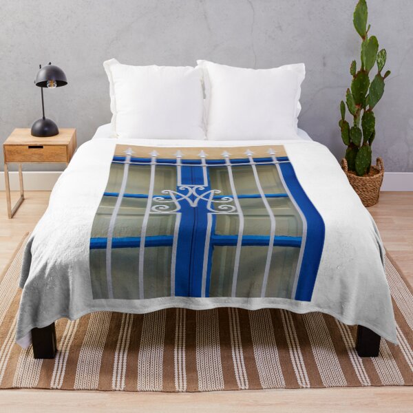 Item preview, Blue Window With Decorative White Wrought Iron Grille and Vertical Bars on Cream Wall designed and sold by Nmallia.