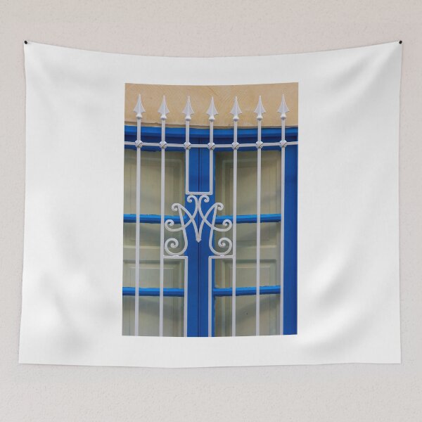 Item preview, Blue Window With Decorative White Wrought Iron Grille and Vertical Bars on Cream Wall designed and sold by Nmallia.