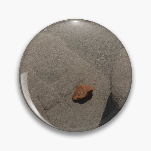 Item preview, Close view of sandy rocks with contrasting burnt orange stone designed and sold by lisavonbiela.