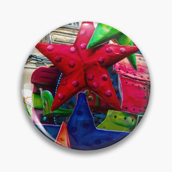 Item preview, Colorful Star Decorations On A Carnival Float During A Street Festival Parade In Historic Town designed and sold by Nmallia.