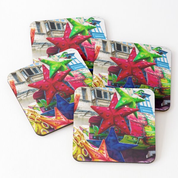 Item preview, Colorful Star Decorations On A Carnival Float During A Street Festival Parade In Historic Town designed and sold by Nmallia.