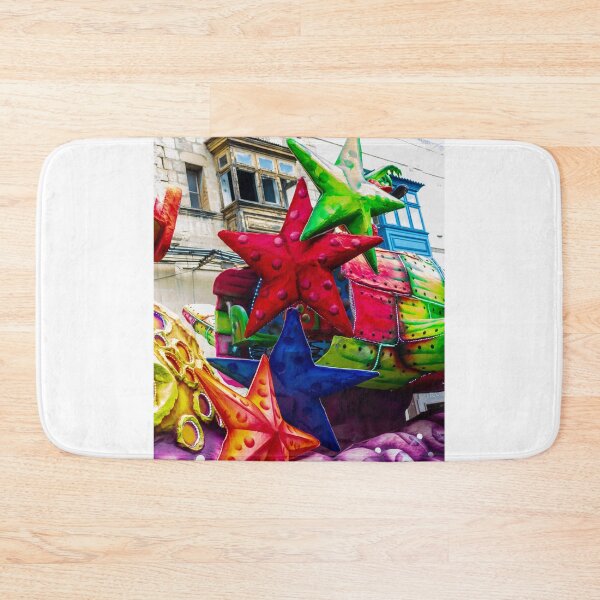 Item preview, Colorful Star Decorations On A Carnival Float During A Street Festival Parade In Historic Town designed and sold by Nmallia.