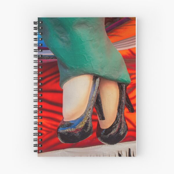 Item preview, Close-Up of Carnival Float Legs in Green Dress and Black High Heels Over Red Background designed and sold by Nmallia.