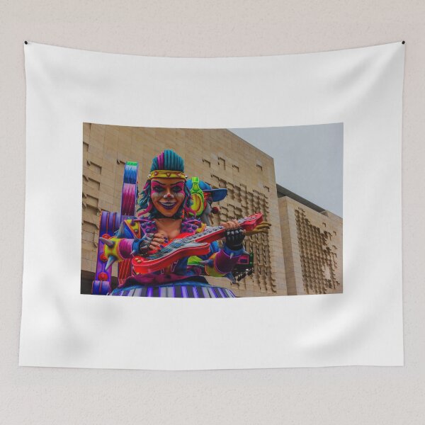 Item preview, Colorful Clown Parade Float Playing Guitar at Urban Carnival Festival in Front of Modern Building designed and sold by Nmallia.