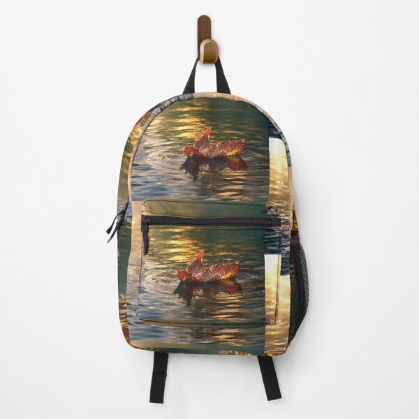 Item preview, Golden Drift – Autumn Leaf on Water designed and sold by Kimberly Palmer.