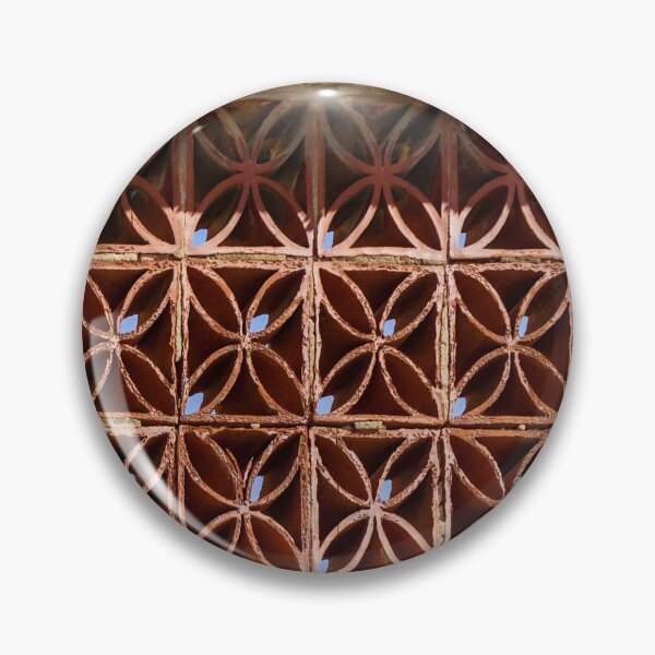 Item preview, Terracotta Ventilation Blocks Forming Decorative Geometric Wall Pattern On Weathered Building designed and sold by Nmallia.