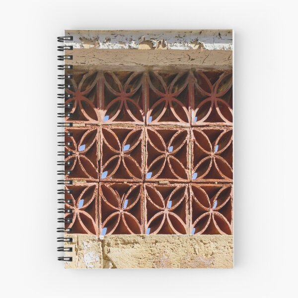 Item preview, Terracotta Ventilation Blocks Forming Decorative Geometric Wall Pattern On Weathered Building designed and sold by Nmallia.