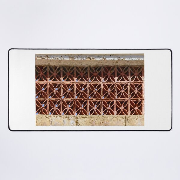 Item preview, Terracotta Ventilation Blocks Forming Decorative Geometric Wall Pattern On Weathered Building designed and sold by Nmallia.