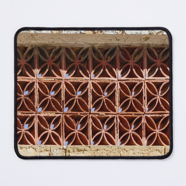 Item preview, Terracotta Ventilation Blocks Forming Decorative Geometric Wall Pattern On Weathered Building designed and sold by Nmallia.
