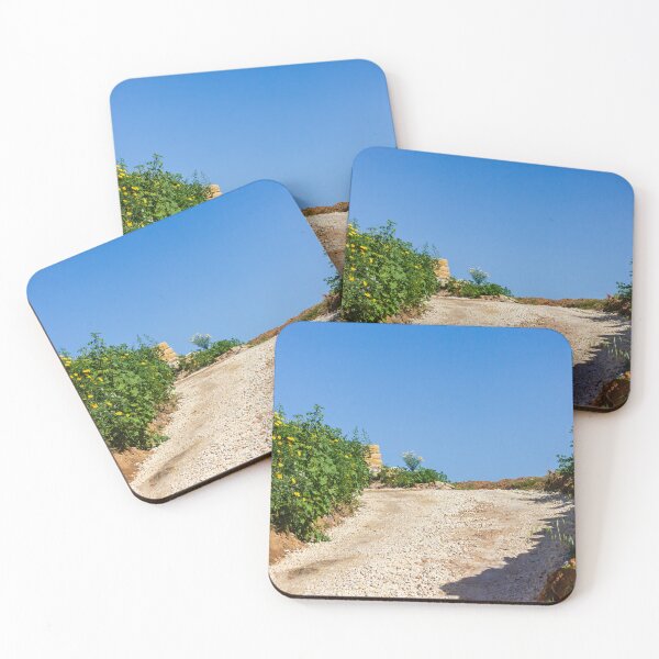 Item preview, Sunny Rural Gravel Road Lined With Yellow Wildflowers And Stone Walls Under Clear Blue Sky designed and sold by Nmallia.