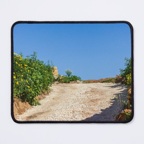 Item preview, Sunny Rural Gravel Road Lined With Yellow Wildflowers And Stone Walls Under Clear Blue Sky designed and sold by Nmallia.