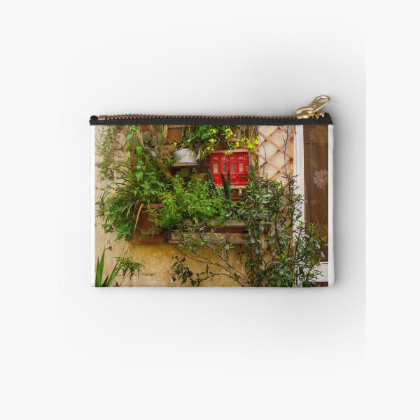 Item preview, Lush Vertical Garden With Yellow Flowers, Potted Plants And Rustic Window Trellis On Stone Wall designed and sold by Nmallia.