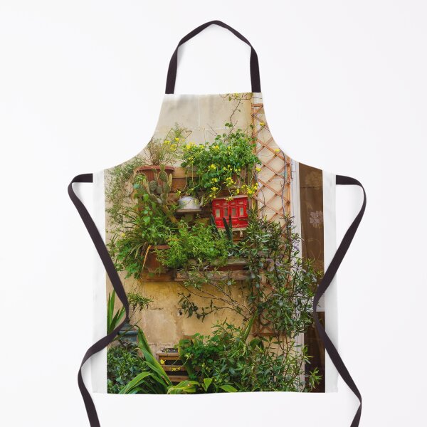 Item preview, Lush Vertical Garden With Yellow Flowers, Potted Plants And Rustic Window Trellis On Stone Wall designed and sold by Nmallia.