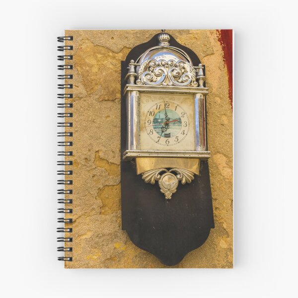 Item preview, Vintage Ornate Wall Clock Mounted on Weathered Stone Wall With Silver Details and Nostalgic Charm designed and sold by Nmallia.