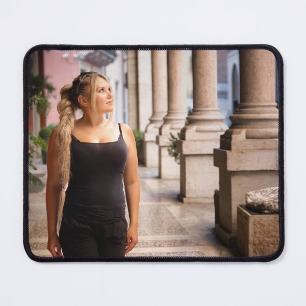 Item preview, Woman walking under historic arcade in Verona, Italy designed and sold by RastislavS.