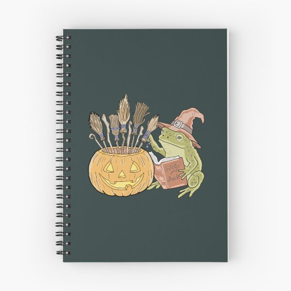 Item preview, Goblincore Halloween Frog Witch Reading Spellbook with Pumpkin Brooms designed and sold by LeshanArt.