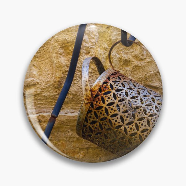 Item preview, Rusty Decorative Watering Can Hanging On Textured Yellow Stone Wall With Vintage Charm designed and sold by Nmallia.