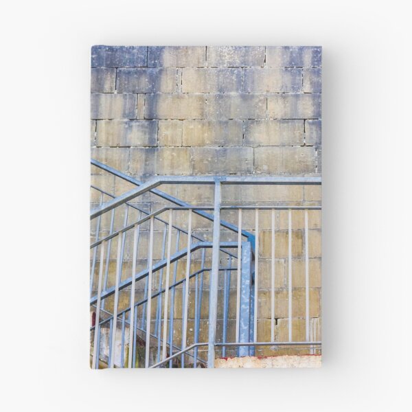Item preview, Weathered Metal Staircase And Railing Against Textured Concrete Block Wall In Urban Setting designed and sold by Nmallia.