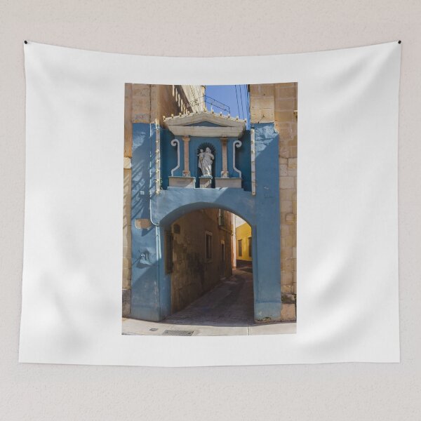 Item preview, Blue Archway With Marian Statue Over Narrow Mediterranean Alleyway in Historic Town designed and sold by Nmallia.