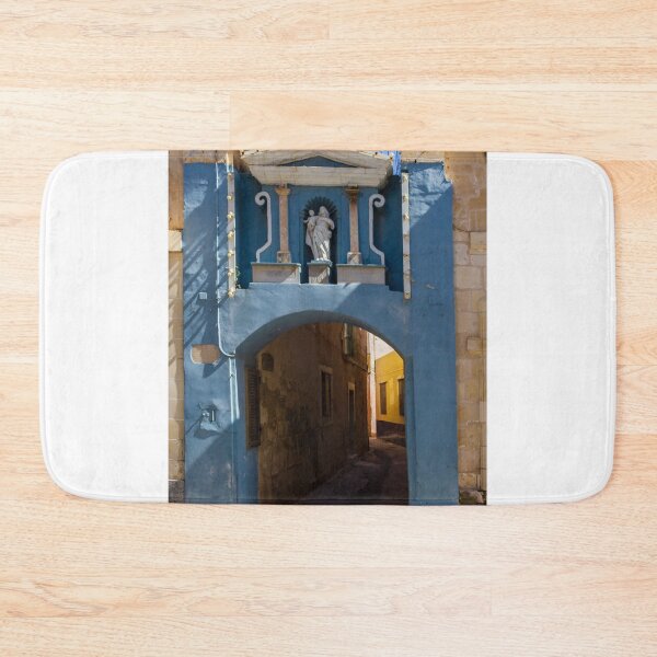 Item preview, Blue Archway With Marian Statue Over Narrow Mediterranean Alleyway in Historic Town designed and sold by Nmallia.