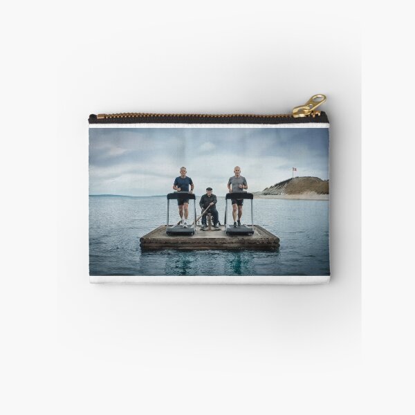 Item preview, Two men are exercising on treadmills atop a raft at sea, steered by a third man designed and sold by Per-Madsen.