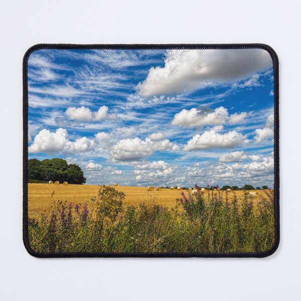 Item preview, British Countryside Harvest: Golden Wheat Field with Straw Bales and Dramatic Blue Sky designed and sold by Astute-Artio-Photography.