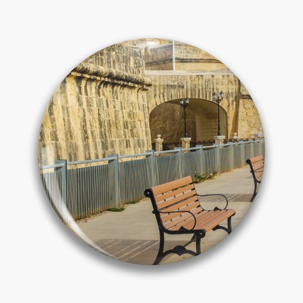 Item preview, Row Of Wooden Benches Along Historic Stone Fort Promenade On Sunny Empty Walkway designed and sold by Nmallia.