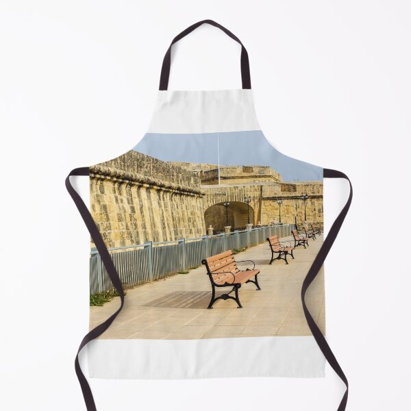 Item preview, Row Of Wooden Benches Along Historic Stone Fort Promenade On Sunny Empty Walkway designed and sold by Nmallia.