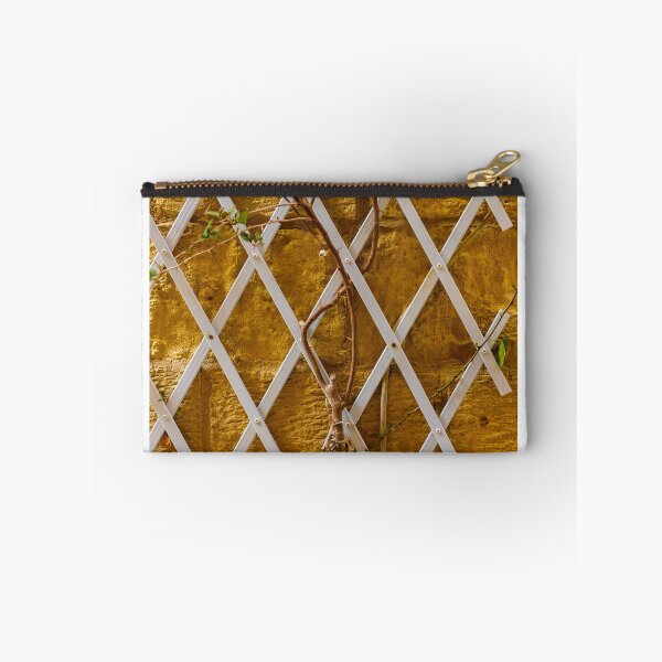 Item preview, Climbing Vine on White Trellis Against Textured Yellow Brick Wall Rustic Garden Background designed and sold by Nmallia.