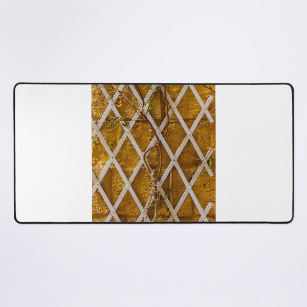 Item preview, Climbing Vine on White Trellis Against Textured Yellow Brick Wall Rustic Garden Background designed and sold by Nmallia.