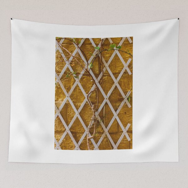 Item preview, Climbing Vine on White Trellis Against Textured Yellow Brick Wall Rustic Garden Background designed and sold by Nmallia.
