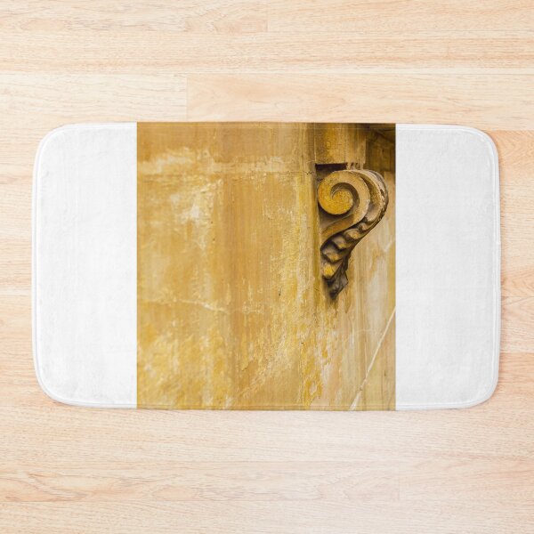 Item preview, Weathered Yellow Wall With Decorative Architectural Corbel and Textured Aged Plaster Detail designed and sold by Nmallia.