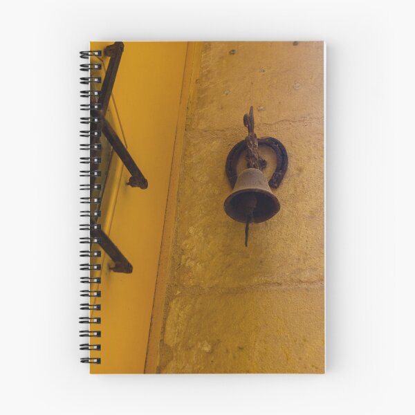 Item preview, Rustic Door Bell and Horseshoe Mounted on Sunlit Yellow Stone Wall in Mediterranean Alley designed and sold by Nmallia.