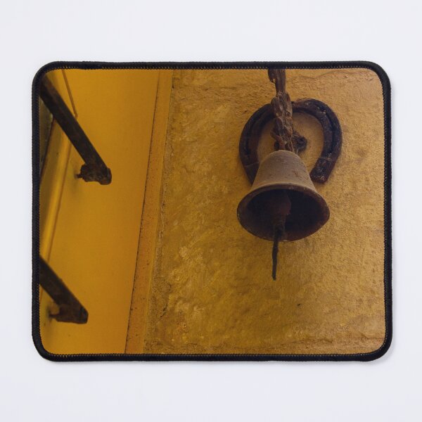 Item preview, Rustic Door Bell and Horseshoe Mounted on Sunlit Yellow Stone Wall in Mediterranean Alley designed and sold by Nmallia.