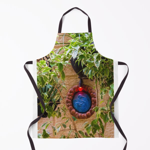 Item preview, Blue Religious Wall Medallion With Red Light Nestled Among Green Garden Foliage On Stone designed and sold by Nmallia.