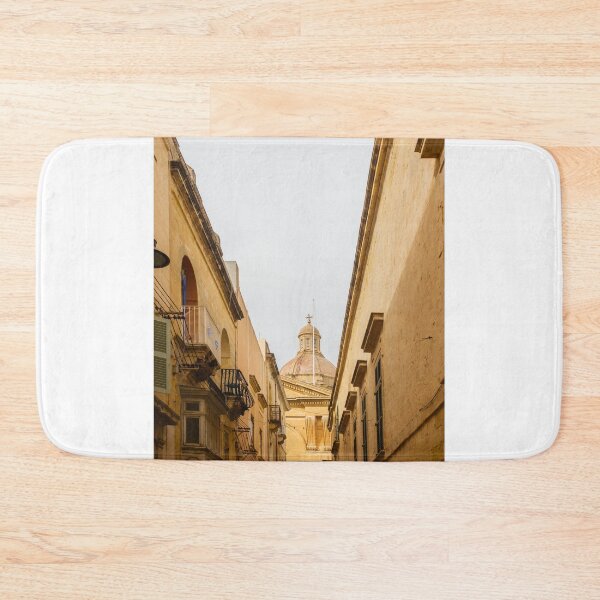 Item preview, Historic Narrow Street Framed By Warm Mediterranean Architecture With A Prominent Stone Dome Above designed and sold by Nmallia.