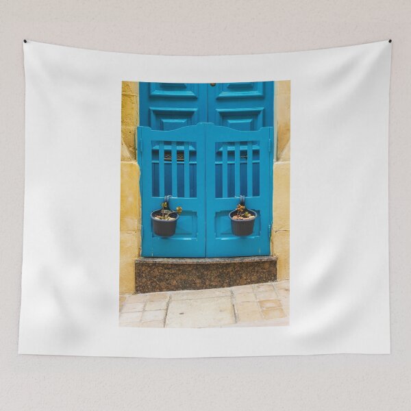 Item preview, Bright Blue Door With Hanging Plant Pots Against Sunlit Yellow Stone Wall In Mediterranean Street designed and sold by Nmallia.