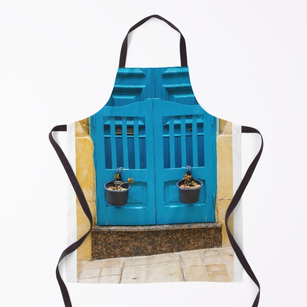 Item preview, Bright Blue Door With Hanging Plant Pots Against Sunlit Yellow Stone Wall In Mediterranean Street designed and sold by Nmallia.