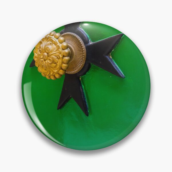 Item preview, Ornate Brass Door Knob on Glossy Green Door with Star-Shaped Backplate, Close-Up Detail designed and sold by Nmallia.