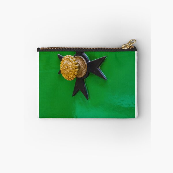 Item preview, Ornate Brass Door Knob on Glossy Green Door with Star-Shaped Backplate, Close-Up Detail designed and sold by Nmallia.