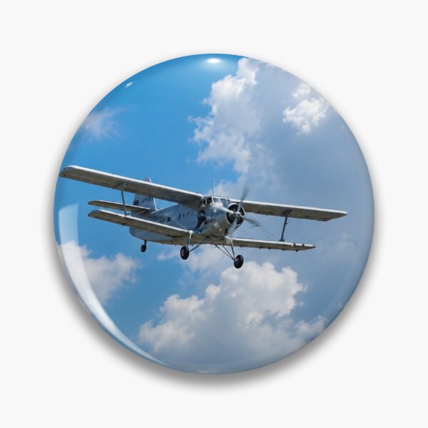 Item preview, Vintage Biplane Soaring Through Fluffy White Cloud in a Bright Blue Sky designed and sold by Astute-Artio-Photography.