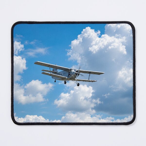 Item preview, Vintage Biplane Soaring Through Fluffy White Cloud in a Bright Blue Sky designed and sold by Astute-Artio-Photography.