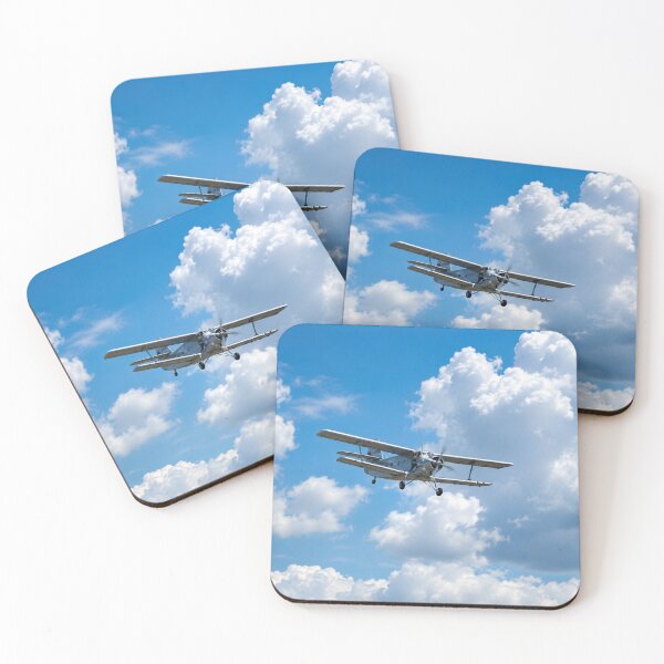 Item preview, Vintage Biplane Soaring Through Fluffy White Cloud in a Bright Blue Sky designed and sold by Astute-Artio-Photography.