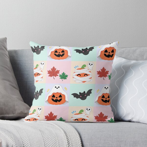 Item preview, Cute hand drawn Halloween seamless pattern  with friendly ghosts, pumpkins, bats, mummy pumpkin and colorful autumn leaves on pastel backgrounds. designed and sold by fangkwl.