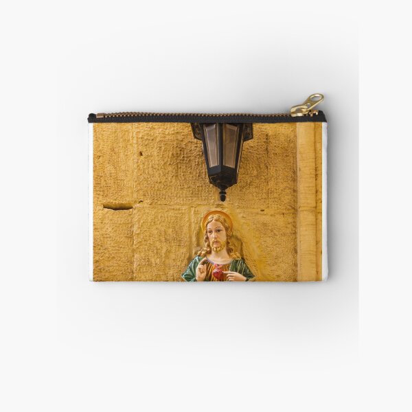 Item preview, Jesus Sacred Heart Statue Beside Vintage Wall Lamp On Stone Church Wall In Warm Light designed and sold by Nmallia.