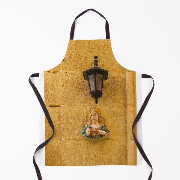 Item preview, Jesus Sacred Heart Statue Beside Vintage Wall Lamp On Stone Church Wall In Warm Light designed and sold by Nmallia.