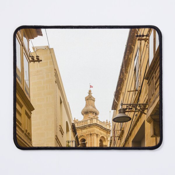 Item preview, Historic Narrow Mediterranean Street Framed By Limestone Buildings With Ornate Church Tower In Background designed and sold by Nmallia.