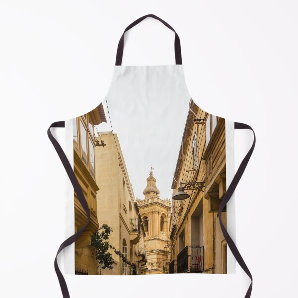 Item preview, Historic Narrow Mediterranean Street Framed By Limestone Buildings With Ornate Church Tower In Background designed and sold by Nmallia.